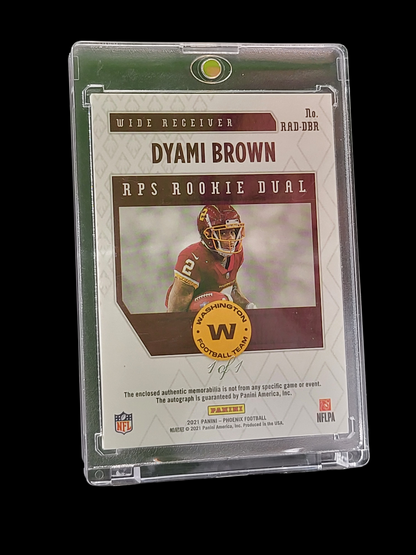 2021 Panini Phoenix Football Dyami Brown #RAD-DBR Dual Patch RC RPS Rookie Dual